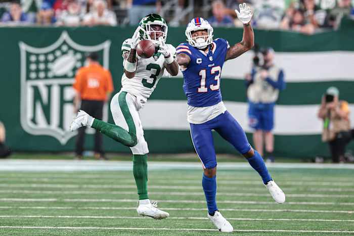 Jets' safety Jordan Whitehead intercepts a pass intended for Bills' WR Gabe Davis